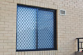 Window grille covers full width of window